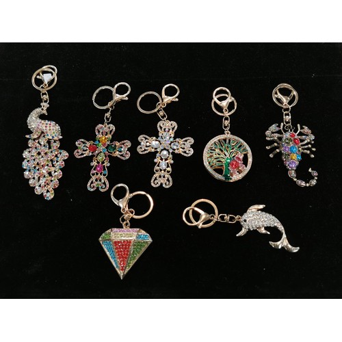 50 - Bright and sparkley bag charm keyrings with colourful glass stones including a peacock, dolphin and ... 