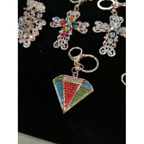 50 - Bright and sparkley bag charm keyrings with colourful glass stones including a peacock, dolphin and ... 