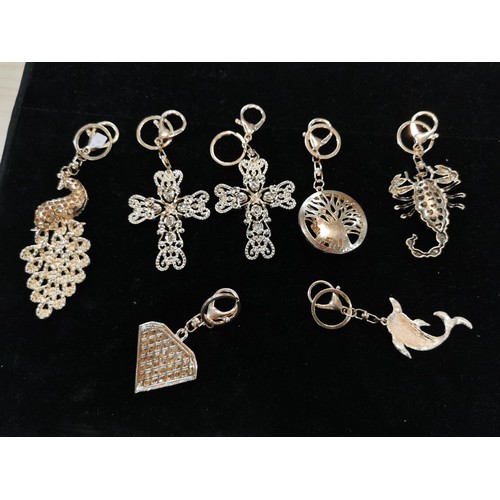 50 - Bright and sparkley bag charm keyrings with colourful glass stones including a peacock, dolphin and ... 