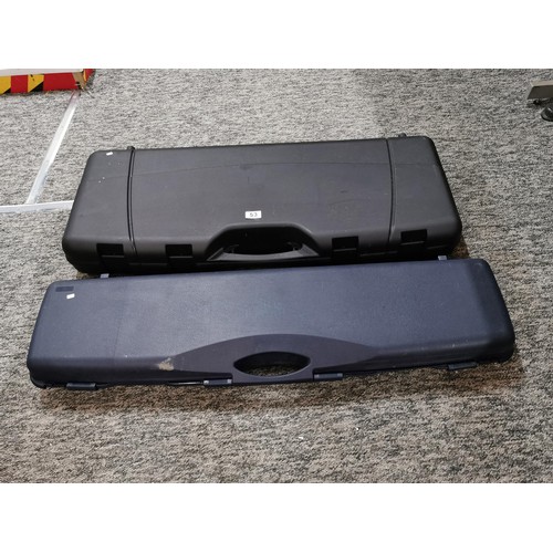 53 - 2x hardcase rifle gun cases with foam insert, one has a small hole see photos. One of the rifle case... 