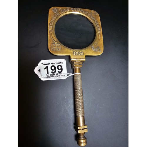 199 - An antique brass advertising magnifying glass for Michelin tyre company dated 1906, the magnifying g... 