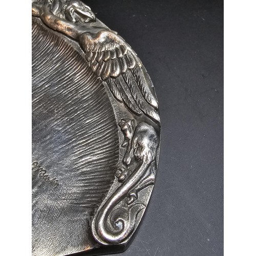 200 - A striking solid pewter carved art nouveau coin tray, hand signed by Marjolein Bastin featuring a gr... 