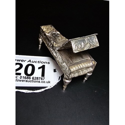 201 - An antique fine quality hallmarked silver Vesta case in the form of a grand piano hallmarked to Shef... 