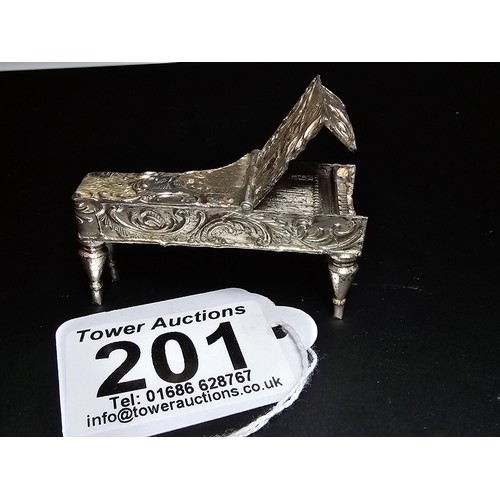 201 - An antique fine quality hallmarked silver Vesta case in the form of a grand piano hallmarked to Shef... 