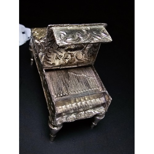 201 - An antique fine quality hallmarked silver Vesta case in the form of a grand piano hallmarked to Shef... 