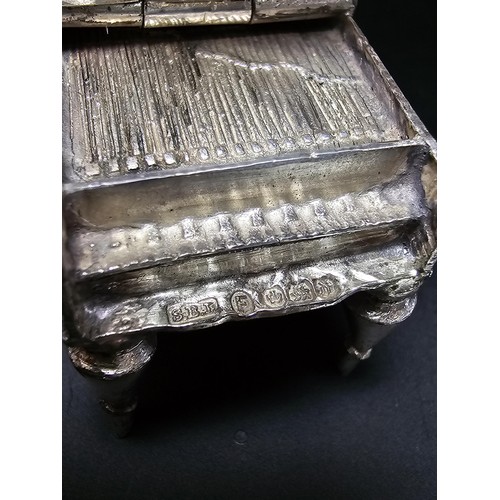 201 - An antique fine quality hallmarked silver Vesta case in the form of a grand piano hallmarked to Shef... 