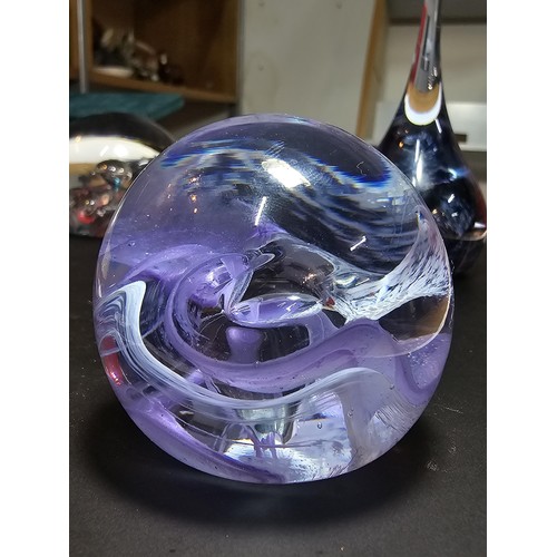 122 - A collection of 4 good named art glass paperweights to include a good Kerry glass paperweight with a... 