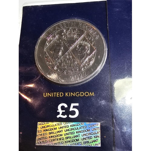 124 - 2x new and sealed change checker coins to include a £5 coin and a 50p coin both dated 2022 and both ... 