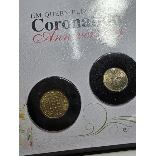 128 - A complete Jubilee mint collection The Queen Elizabeth II Coronation anniversary 10 coin cover which... 