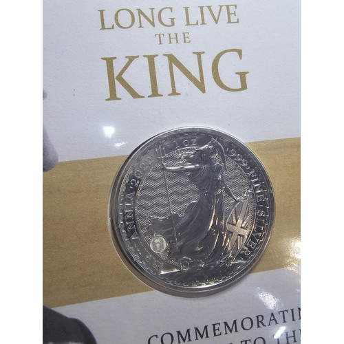 129 - A Westminster collection Long Live The King silver coin cover which includes a stamped cover of one ... 