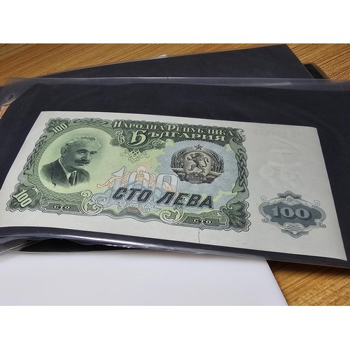 130 - A large collection of various world bank notes organized in to plastic sleeves along with a small qu... 