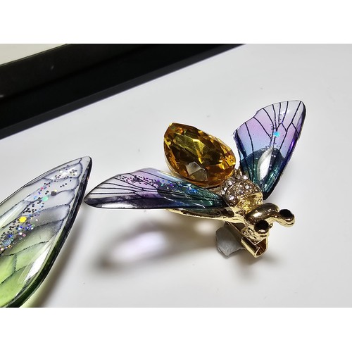 135 - 2x very pretty Pique a Jour style brooches which includes a butterfly and bee, both having colourful... 