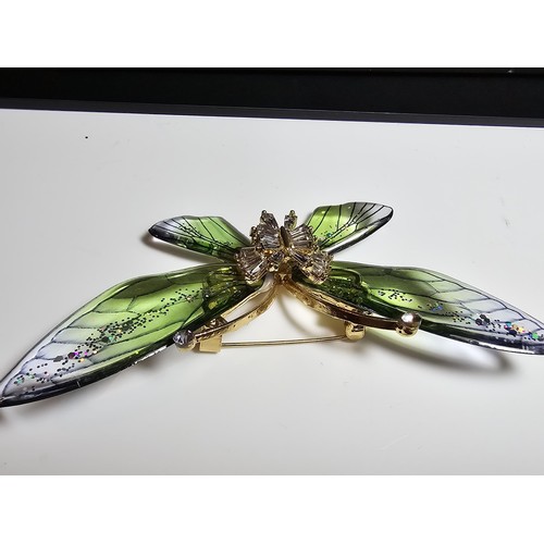 135 - 2x very pretty Pique a Jour style brooches which includes a butterfly and bee, both having colourful... 