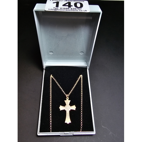 140 - A 925 silver cross pendant on an 18