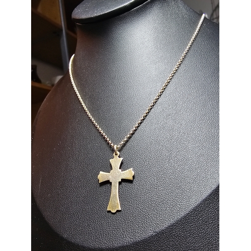 140 - A 925 silver cross pendant on an 18