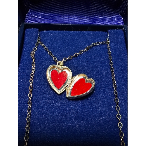 146 - Boxed Excalibur 925 sterling silver heart locket and 18