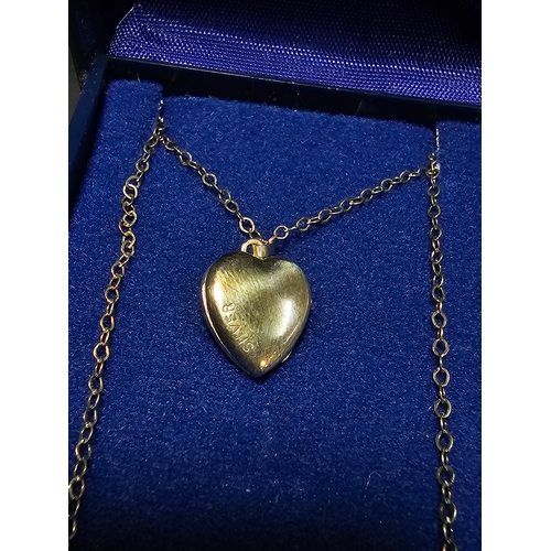 146 - Boxed Excalibur 925 sterling silver heart locket and 18