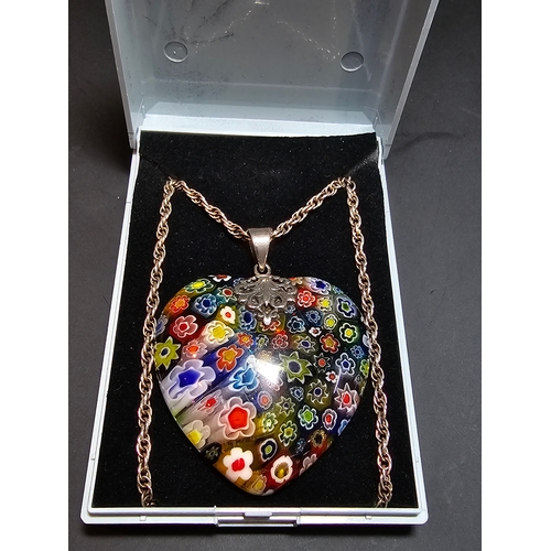 148 - A stunning 925 silver Murano Italy necklace which features a large & impressive heart formed art gla... 