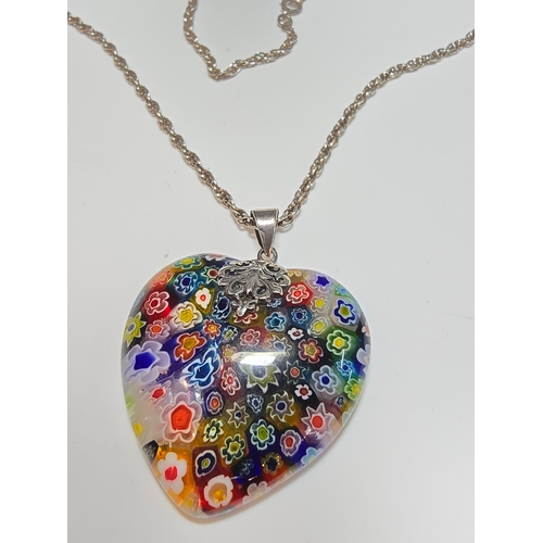 148 - A stunning 925 silver Murano Italy necklace which features a large & impressive heart formed art gla... 