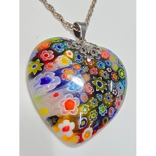 148 - A stunning 925 silver Murano Italy necklace which features a large & impressive heart formed art gla... 