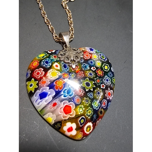 148 - A stunning 925 silver Murano Italy necklace which features a large & impressive heart formed art gla... 