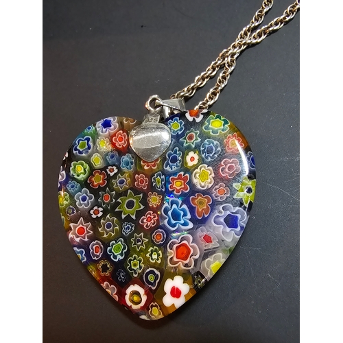 148 - A stunning 925 silver Murano Italy necklace which features a large & impressive heart formed art gla... 