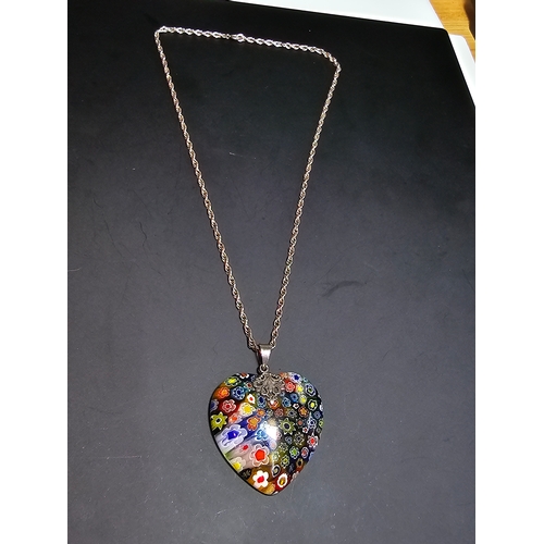 148 - A stunning 925 silver Murano Italy necklace which features a large & impressive heart formed art gla... 