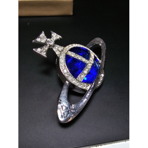 150 - A Vivienne Westwood style blue orb and cross jeweled brooch, displays well, In excellent clean condi... 