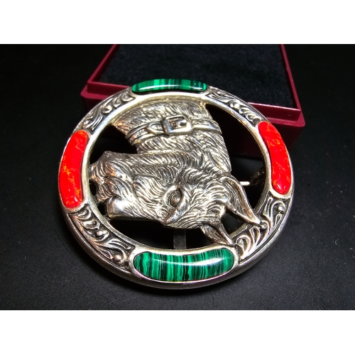 154 - A stunning 925 silver Celtic brooch / pendant featuring a well detailed Scottie dog's head to the ce... 