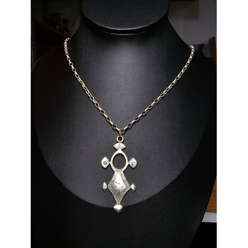 156 - A good quality 925 silver necklace which features a hand crafted sterling silver drop pendant on a g... 