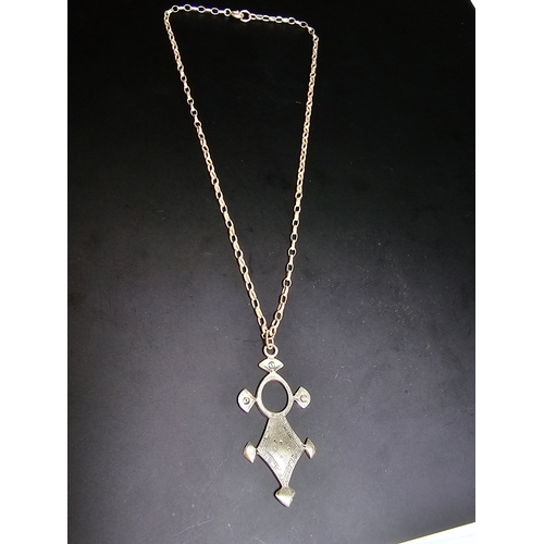 156 - A good quality 925 silver necklace which features a hand crafted sterling silver drop pendant on a g... 