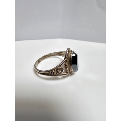 161 - 925 Silver ring inset with a large faceted marcasite stone, size J, in good clean condition complete... 