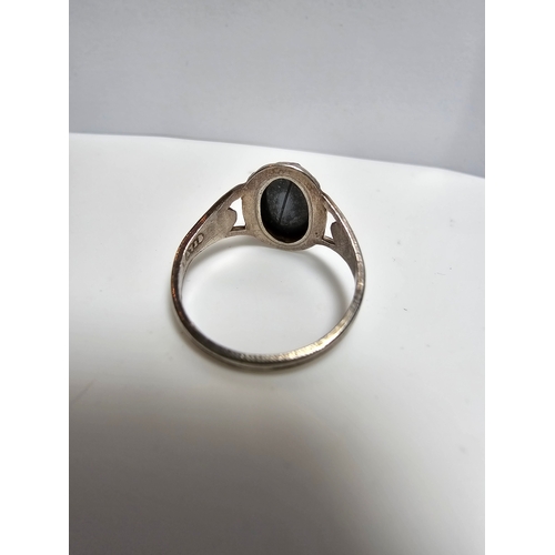 161 - 925 Silver ring inset with a large faceted marcasite stone, size J, in good clean condition complete... 