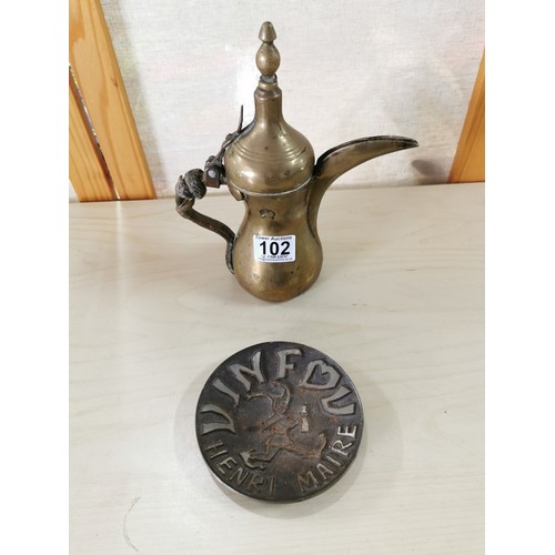 102 - Rare antique Middle Eastern Arabic brass Dallah coffee pot, animal hide can still be seen on the han... 