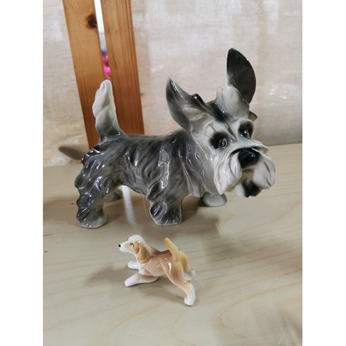 103 - Qty of good quality figurines which includes resin shire horse and cartwheel, glazed ceramic Schnauz... 