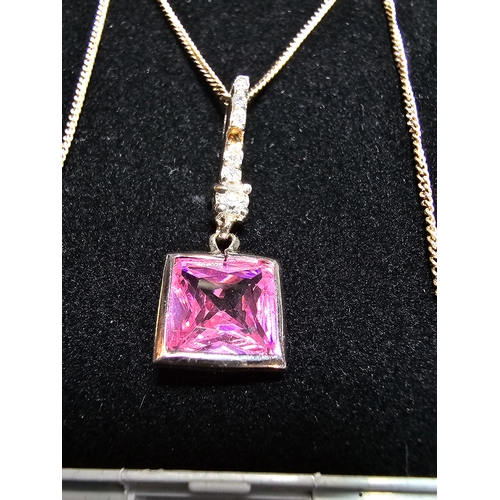 170 - Pretty 925 Silver pendant inset with a striking pink cz crystal stone and smaller clear crystal ston... 