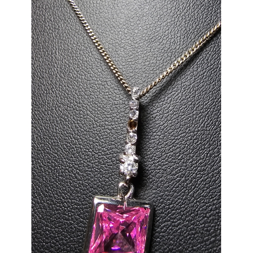 170 - Pretty 925 Silver pendant inset with a striking pink cz crystal stone and smaller clear crystal ston... 