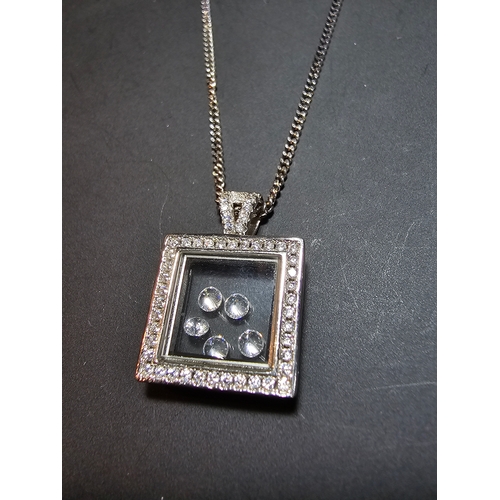 171 - As new & unused 925 Silver & glass pendant inset with small clear crystals, on a long 22