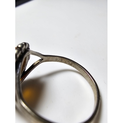 174 - Good vintage 925 Silver ring inset with a large natural amber stone, size N, in good clean condition... 