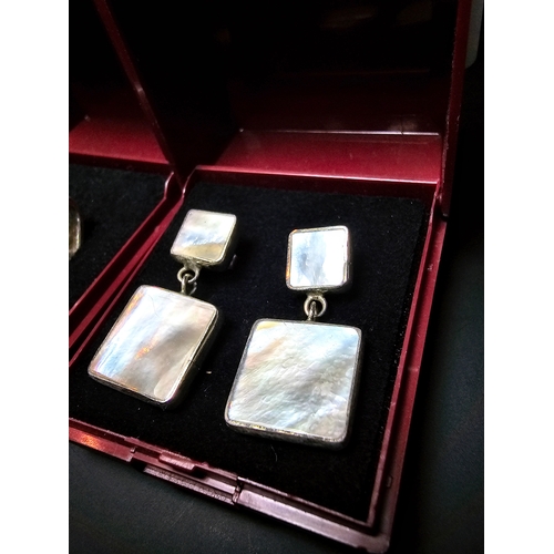 177 - Bundle of 2x boxed pairs of 925 silver earrings to include a good drop pair inset with mother of pea... 