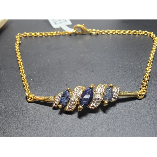 180 - As New gold plated bracelet inset with real sapphire stones, along with an as new 14ct rolled gold n... 