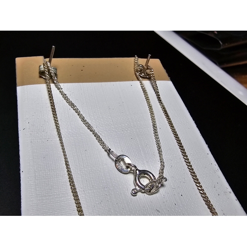 181 - A pretty 925 silver matching jewellery set to include pendant, pendant & necklace and matching earri... 