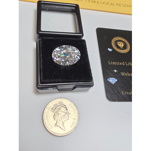 228 - A stunning rare and large 8ct oval moissanite diamond size of 14mm x 10mm with full report, the mois... 