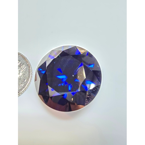 230 - A stunning very rare and large 30ct Royal Blue Moissanite Diamond with a diameter of 20mm with full ... 