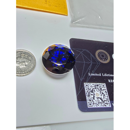 230 - A stunning very rare and large 30ct Royal Blue Moissanite Diamond with a diameter of 20mm with full ... 