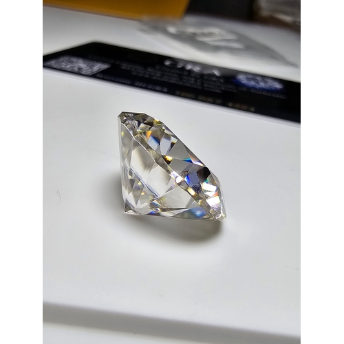 231 - A stunning very rare and large 30ct Belgian Cut Clear Moissanite Diamond with a diameter of 20mm wit... 