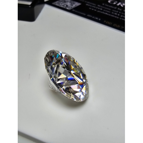 231 - A stunning very rare and large 30ct Belgian Cut Clear Moissanite Diamond with a diameter of 20mm wit... 