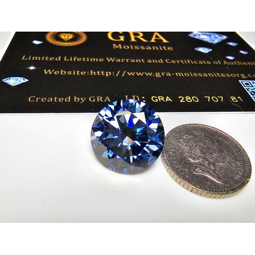 232 - A stunning rare and large 10ct Light Royal Blue Moissanite Diamond with a diameter of 14mm with full... 