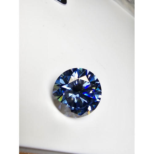 232 - A stunning rare and large 10ct Light Royal Blue Moissanite Diamond with a diameter of 14mm with full... 