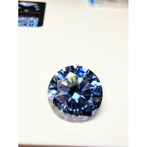 232 - A stunning rare and large 10ct Light Royal Blue Moissanite Diamond with a diameter of 14mm with full... 